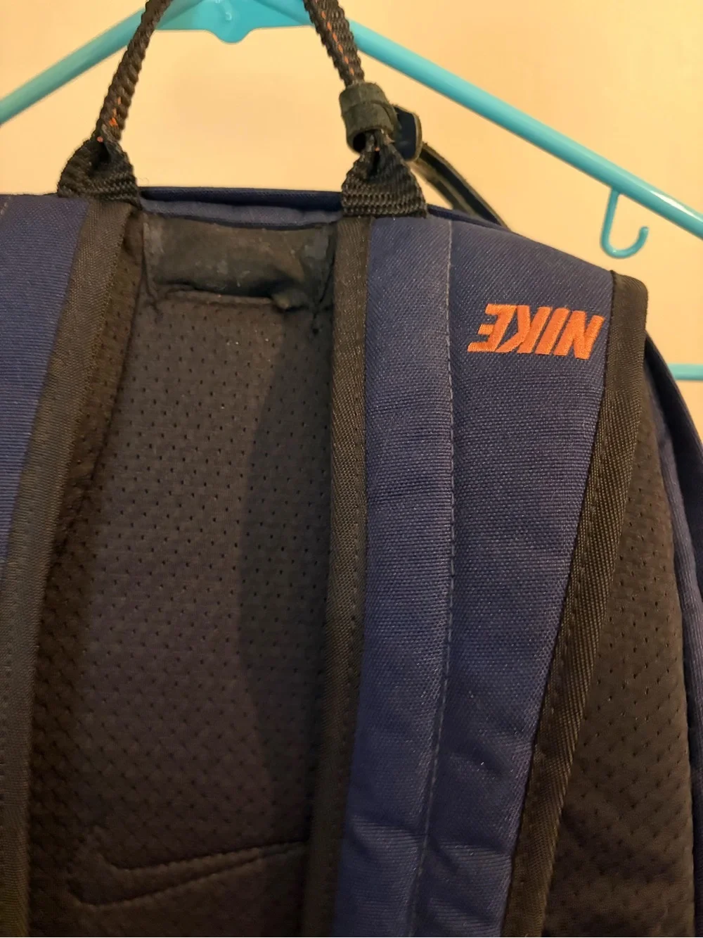 Nike Dark Blue Backpack with Orange Logo Accent